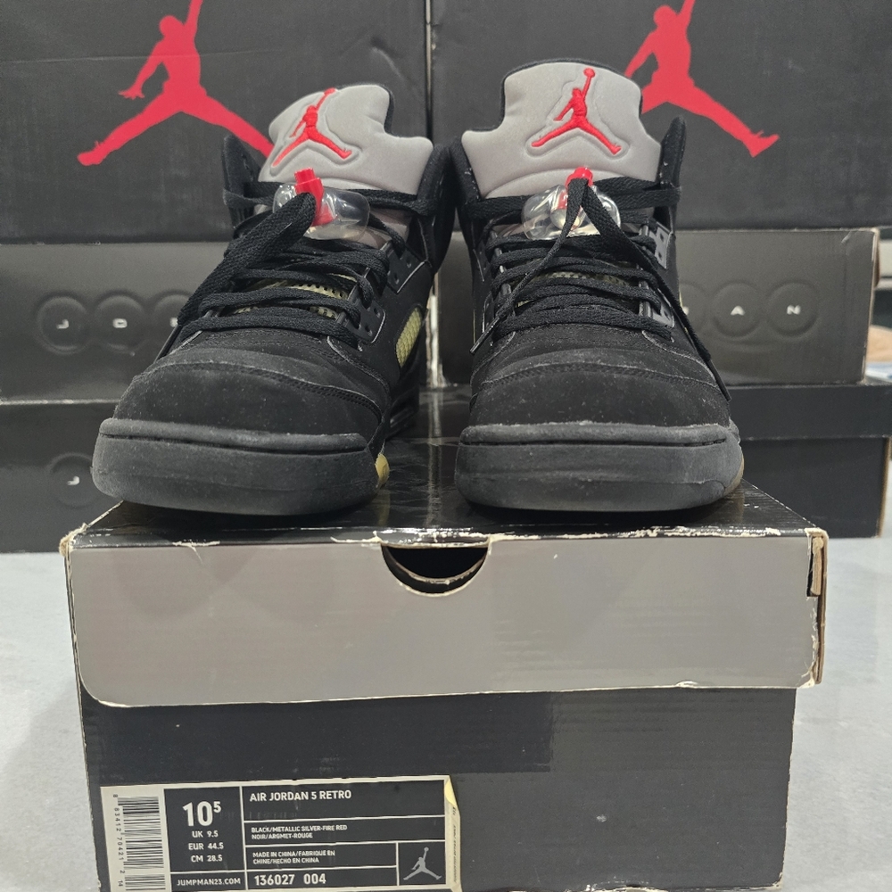 This is a pair of Air Jordan 5 Retro OG 'Black Metallic Reimagined' sneakers wit